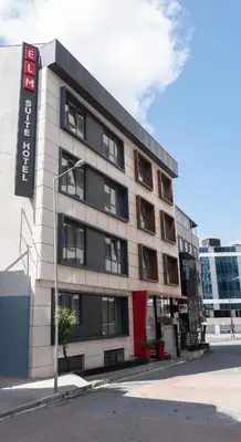 a building with a sign on the side of it at Elm Suite Hotel in Istanbul