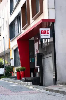 a building with a garage with a sign on it at Elm Suite Hotel in Istanbul