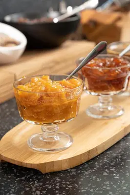 a bowl of food on a wooden cutting board at Elm Suite Hotel in Istanbul