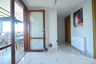 a room with a door and a bike on the floor at Safir Gold Hotel in Istanbul