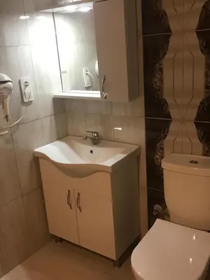 a bathroom with a sink and a toilet at Gul Otel in Istanbul