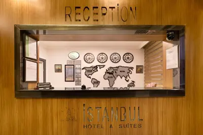a store window with a sign that reads island hotel and suites at İstanbul Hotel & Suites in Istanbul