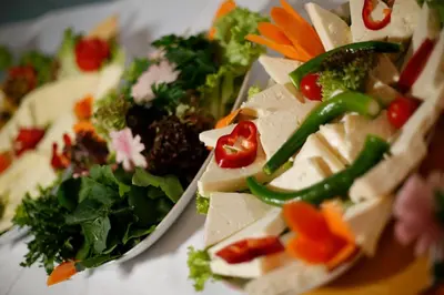 a plate of food with vegetables and other foods at Grand Papirus Hotel in Istanbul