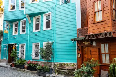 a blue house on a street in a city at Wonder Wood Hotel in Istanbul