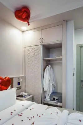 a room with a bed and a closet at OBAHAN HOTEL-Special Class in Istanbul