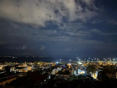 a view of a city at night with lights at Mayer Hotel Istanbul in Istanbul
