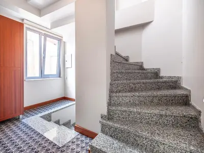 a staircase in a room with a window at Mint Residence Taksim in Istanbul