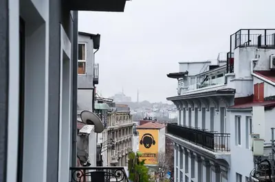 a view from a window of a city with buildings at Royal Galata Hotel in Istanbul