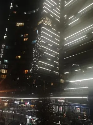 a tall building at night with lights on it at Have a nice holiday in Istanbul