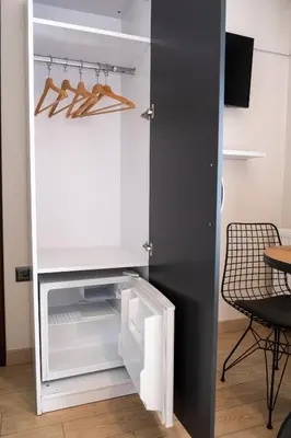 a white refrigerator with its door open in a room at Campus Boutique Hotel in Istanbul