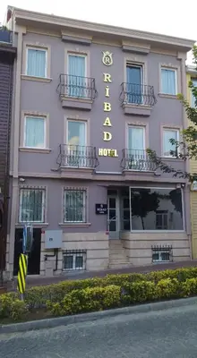 a pink building with a hotel sign on it at Ribad Hotel Sultanahmet in Istanbul