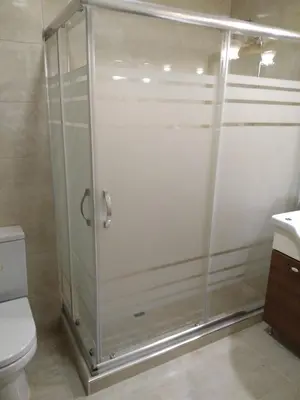 a shower stall in a bathroom with a toilet at Ribad Hotel Sultanahmet in Istanbul