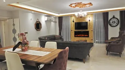 a living room with a table and a couch at Bahar Villas Sapanca in Sapanca