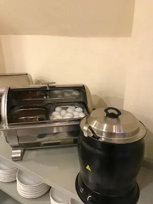 a kitchen counter with a pot and a foodquart at GALATAHAN Hotel Istanbul Karakoy in Istanbul