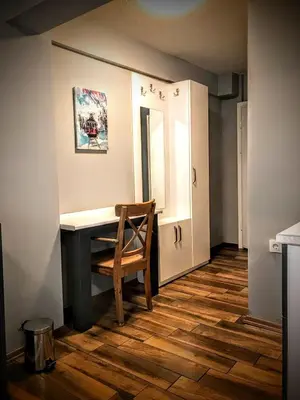 a room with a desk and a chair next to a door at Rodos HAN in Istanbul
