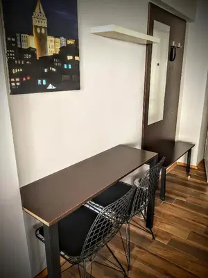 a desk and a chair in a room at Rodos HAN in Istanbul