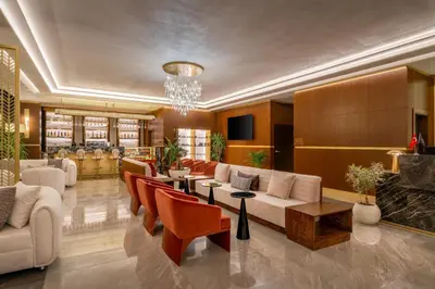 a living room with a couch and chairs at Best Western Premier Hidden Hills Hotel in Istanbul