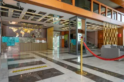 a lobby of a building with a red ribbon at The Bostancı Otel in Istanbul