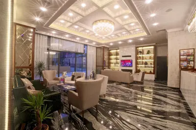 a lobby of a hotel with chairs and a bar at My Dream Istanbul Hotel in Istanbul