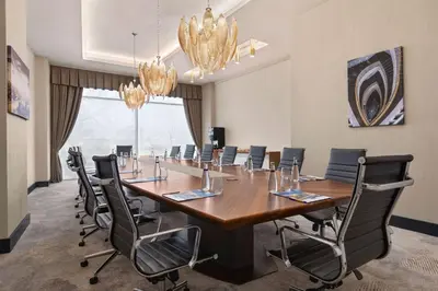 a conference room with a long table and chairs at Tryp by Wyndham Istanbul Topkapi in Istanbul