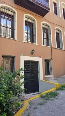a building with a black door and windows at The Pashas House in Istanbul
