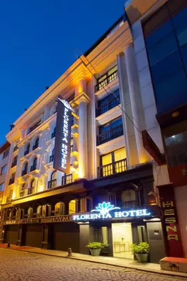 a hotel building with a sign in front of it at New Florenta Hotel in Istanbul