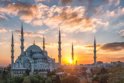 a view of theultan ahmet mosque in istanbul at sunset at QONAQ HOTEL & SUITES in Istanbul