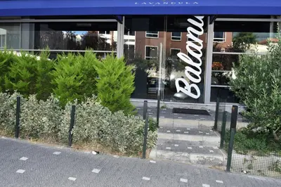 a store with a sign on the front of it at Levent Lavandula Hotel in Istanbul