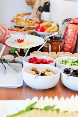 a table topped with bowls of food and plates of food at Levent Lavandula Hotel in Istanbul