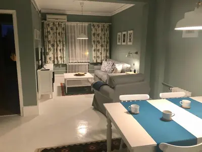 a living room with a couch and a table at Mehmet Bey Suites in Istanbul