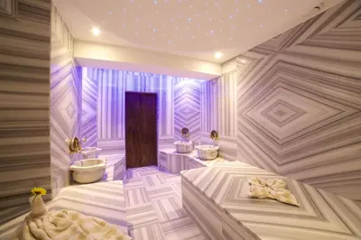 a bathroom with two toilets and a sink at SORRISO HOTEL DUE in Istanbul