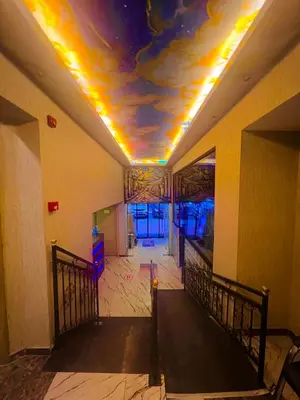 a hallway with a ceiling with a painting on it at Elit Palace Hotel in Istanbul
