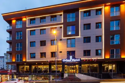 a hotel building with a sign on it at Urban Hotel Bomonti in Istanbul