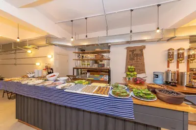 a buffet line with many different types of food at Rumours Inn in Istanbul