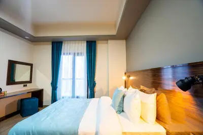 a hotel room with a bed and a window at Mugwort Hotel & Spa in Istanbul