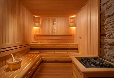 a sauna with a tub and a stove at Radisson Blu Hotel, Sakarya in Sakarya