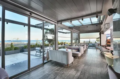 a restaurant with a view of the ocean at Best Western Premier Ottoperla Hotel in Istanbul