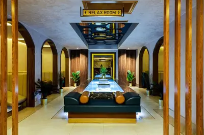 a lobby with a blue couch in a building at Beethoven Senfoni Hotel in Istanbul