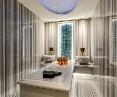 a bathroom with two sinks and a large window at Beethoven Senfoni Hotel in Istanbul