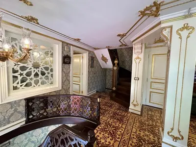 a hallway of a house with a staircase and a door at TAHTAKALE KONAK HOTEL Private & Luxury in Bursa