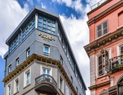 a building with a sign on the side of it at Petros Hotel in Istanbul