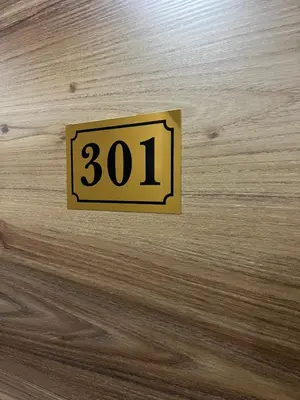 a clock on the ceiling of a wooden floor at Seaway Hotel İstanbul in Istanbul