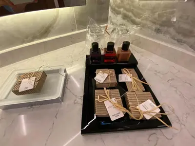 a table with a box of cookies on a counter at Vital Hotel Fulya Istanbul Sisli in Istanbul