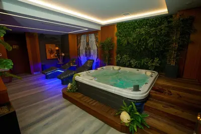 a jacuzzi tub in a living room at Vital Hotel Fulya Istanbul Sisli in Istanbul