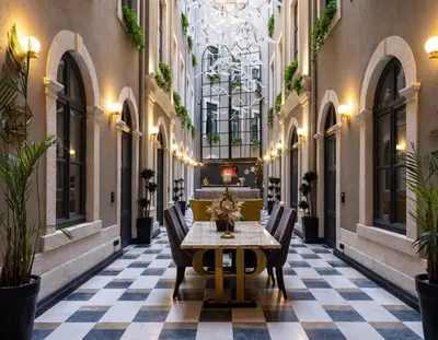 a hallway with a table and chairs in a building at Ferman Port Hotel - Special Category in Istanbul