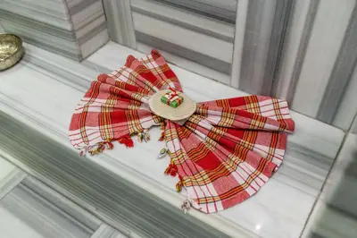 a red and yellow bow on a window sill at Best Point Suites Old City,Istanbul in Istanbul