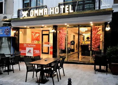 a restaurant with a table and chairs in front of it at OMMA HOTEL in Istanbul