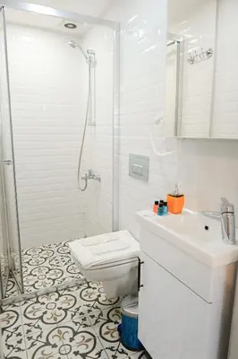 a bathroom with a toilet and a shower and a sink at Galata Dream Hotel in Istanbul