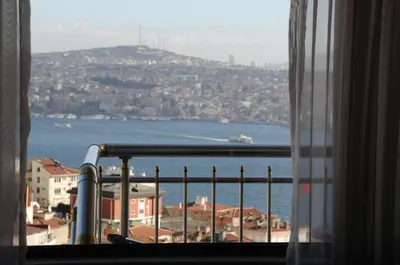 a window with a view of the ocean and buildings at Grand Star Hotel Premium in Istanbul