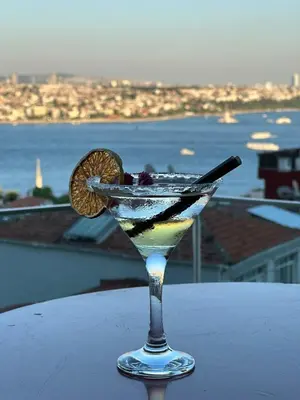 a drink on a table with a view of the water at Grand Star Hotel Premium in Istanbul